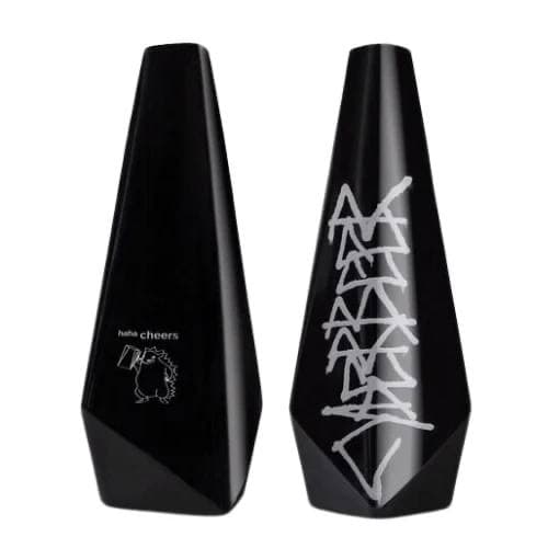 Tesla CyberBeer bottle engraved with the hedgehog and the words "haha cheers"